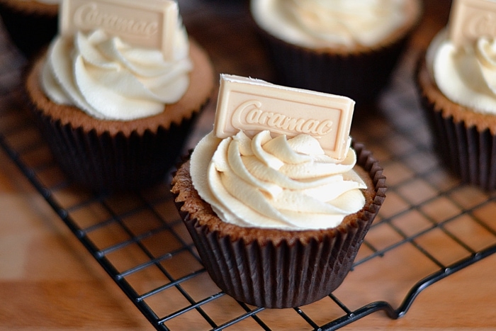 Caramac Cupcakes. Caramel white chooclate cupcakes, topped with a caramac buttercream and square of chocolate.
