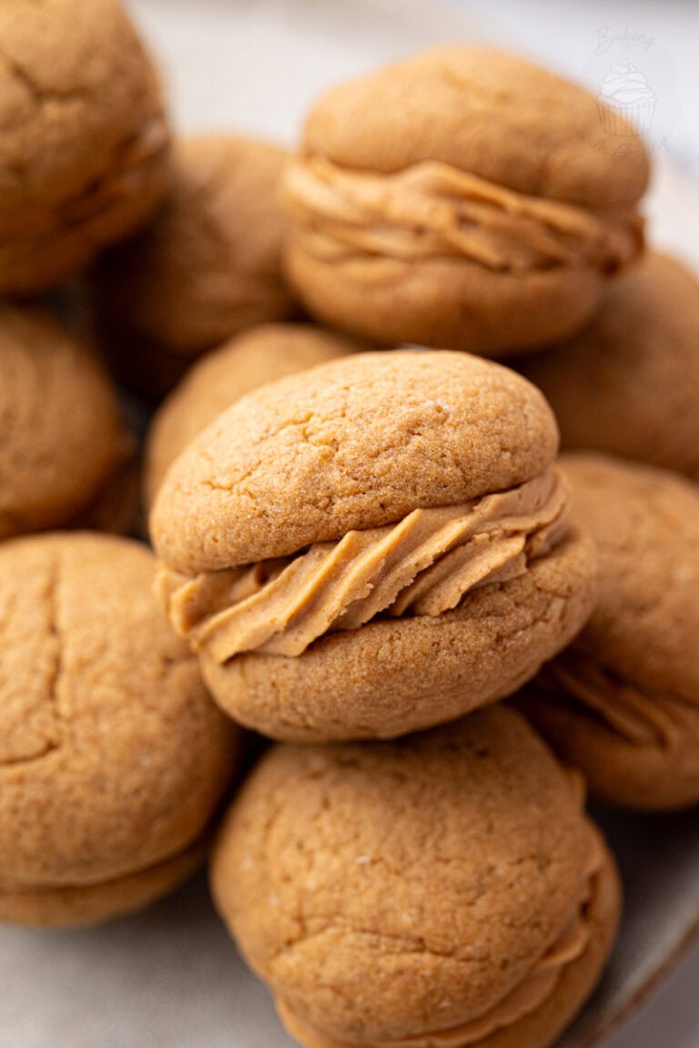 Close-up of coffee kisses biscuits showing the soft coffee buttercream filling.