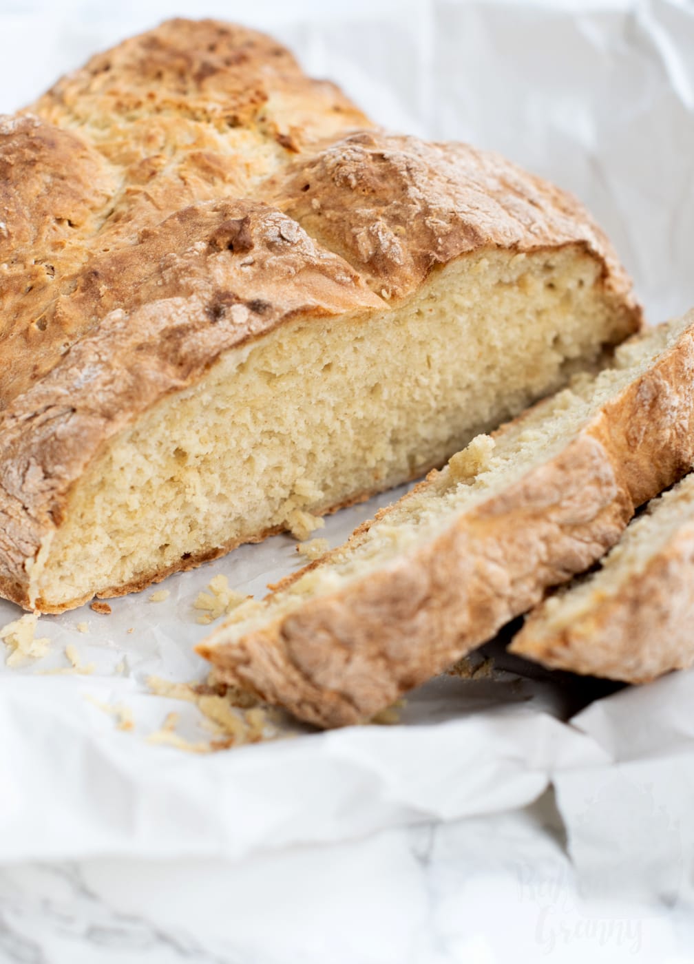 Slice Irish soda bread.