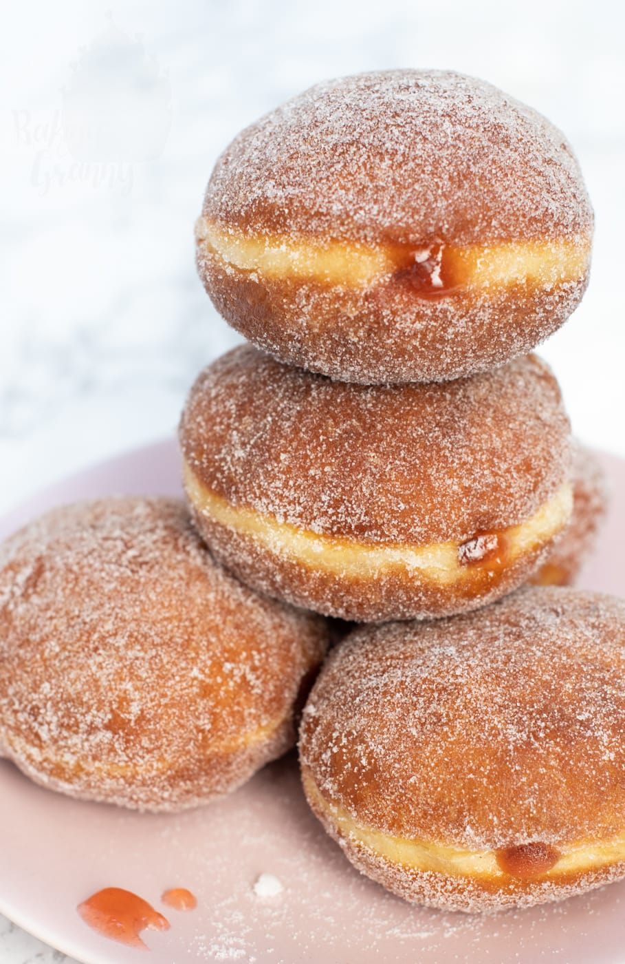 Jam donuts made with raspberry jam.