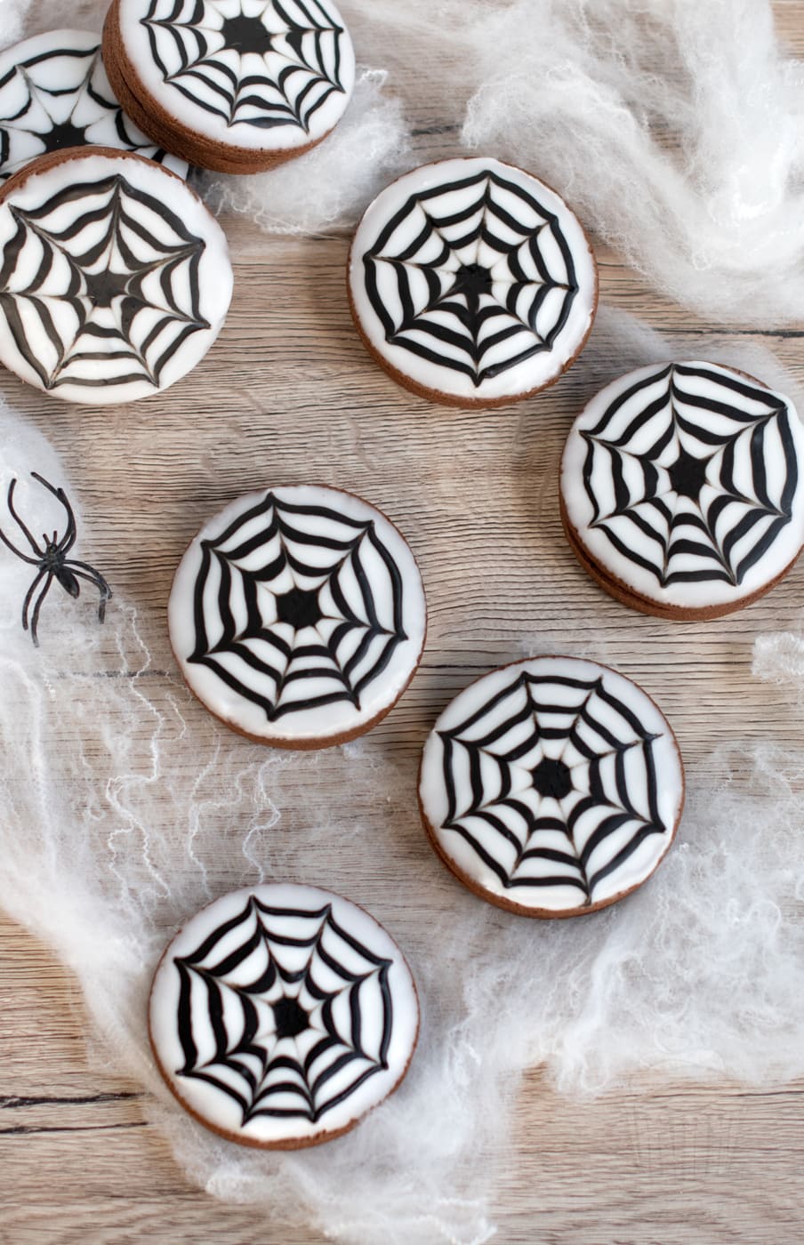 Spider web biscuits, using an empire biscuit recipe and white and black icing for a spooky decoration.