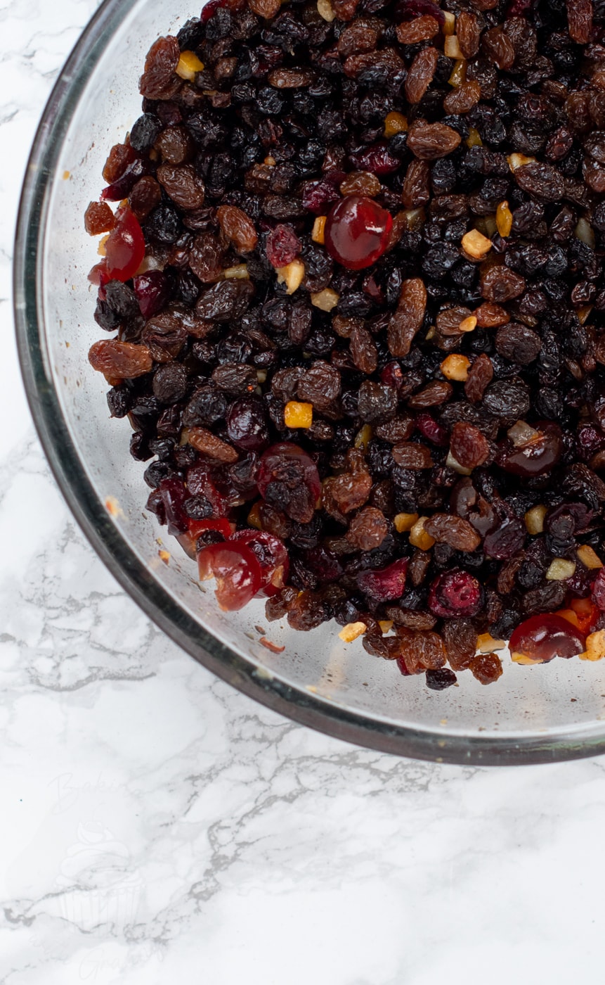 Dried fruit soaking over night in orange juice, as part of our classic Christmas Cake recipe.