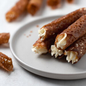 Brandy snaps from Baking with Granny. Traditional recipe for sweet, brandy-infused biscuits. best when filled with fresh cream.