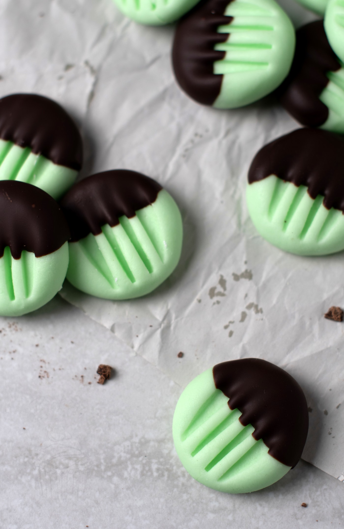 Peppermint creams recipe. Little peppermint cream sweets, made with icing sugar and egg white. Finished with some dark chocolate.