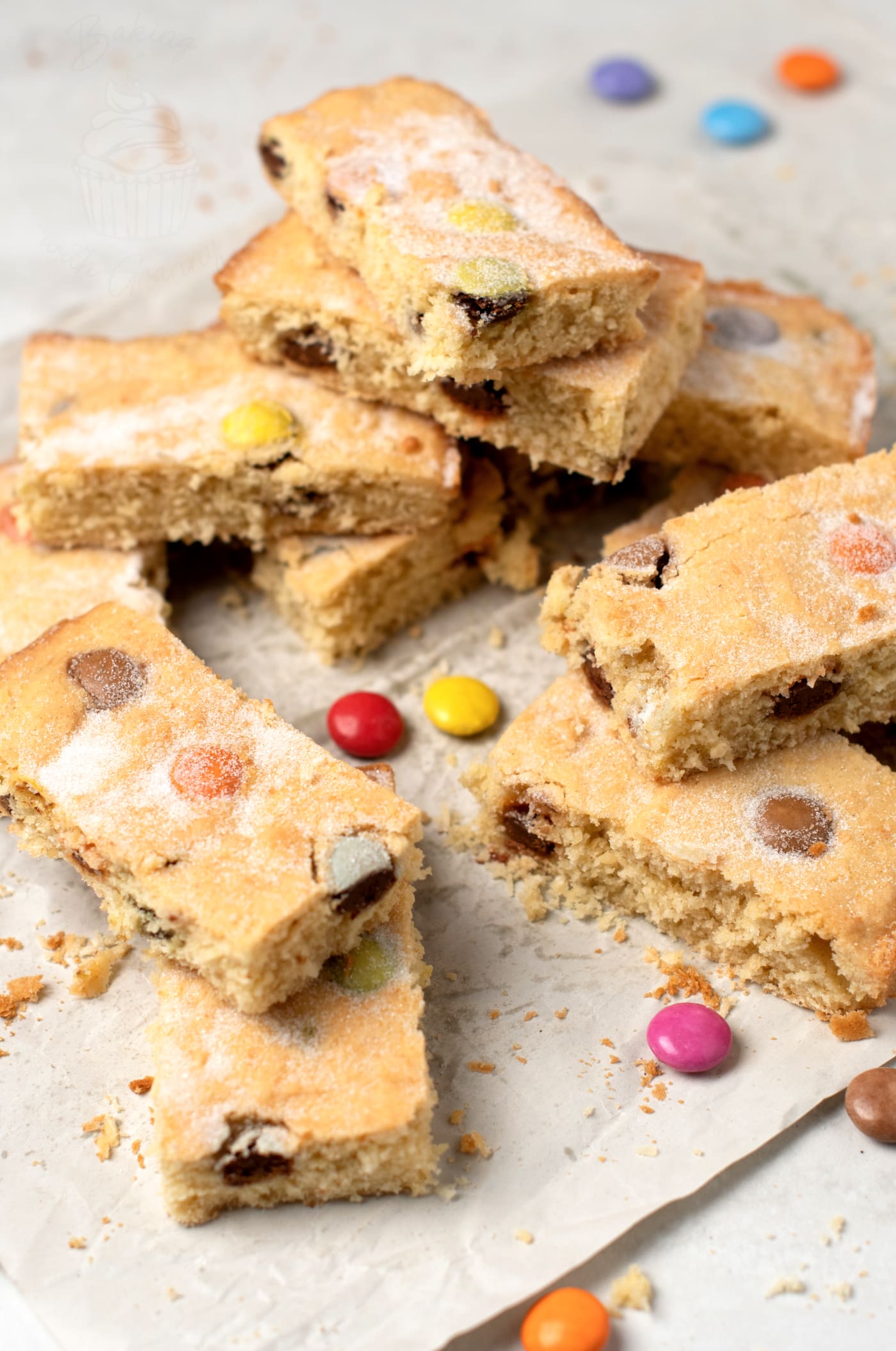 Polka Dot Slice recipe from Baking with Granny. A rainbow cake traybake, made with smarties, coconut and plenty of sugar.