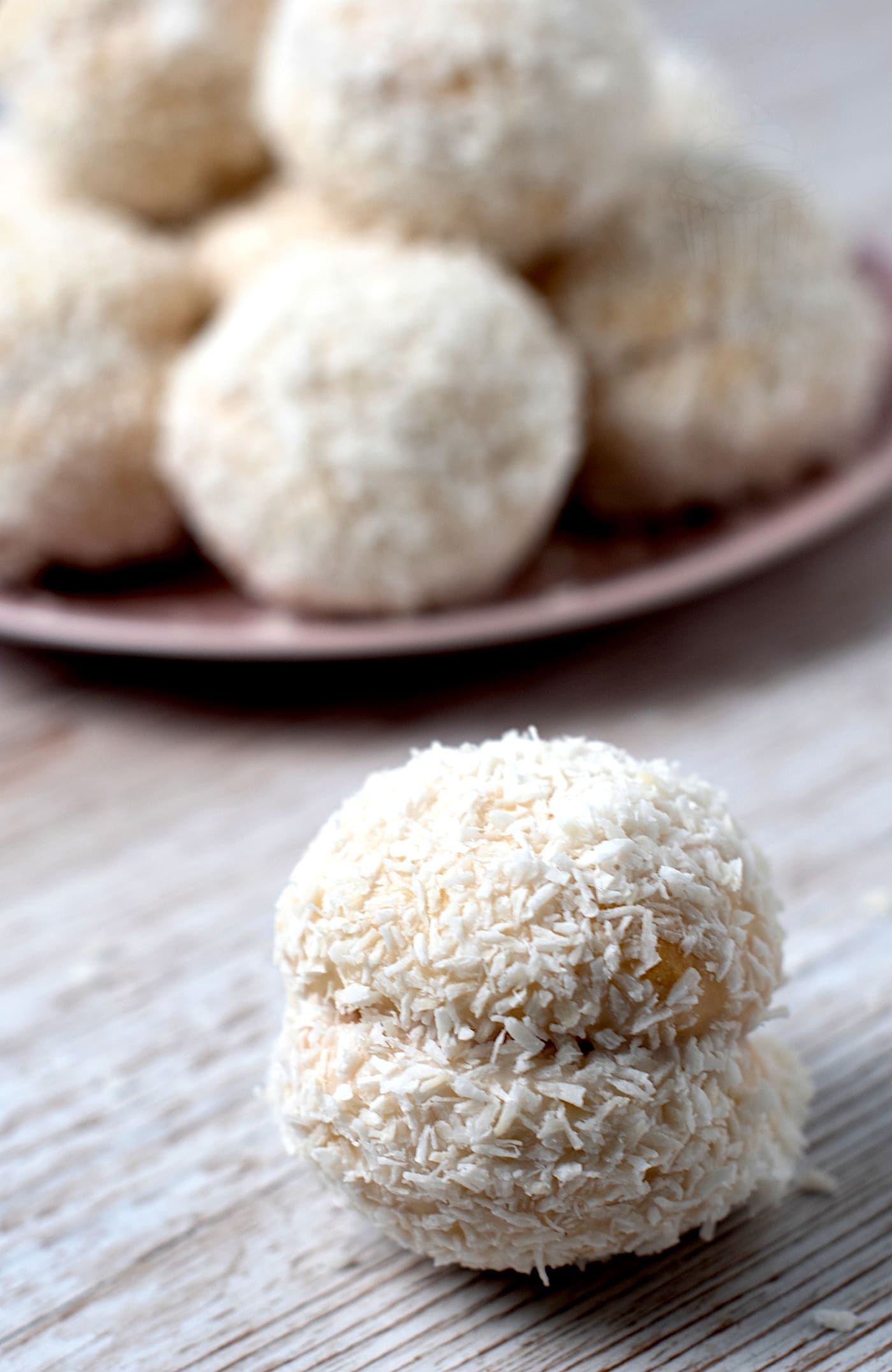 Scottish Snowballs recipe. Little buns, sandwiched with jam, covered in icing, coated in coconut.