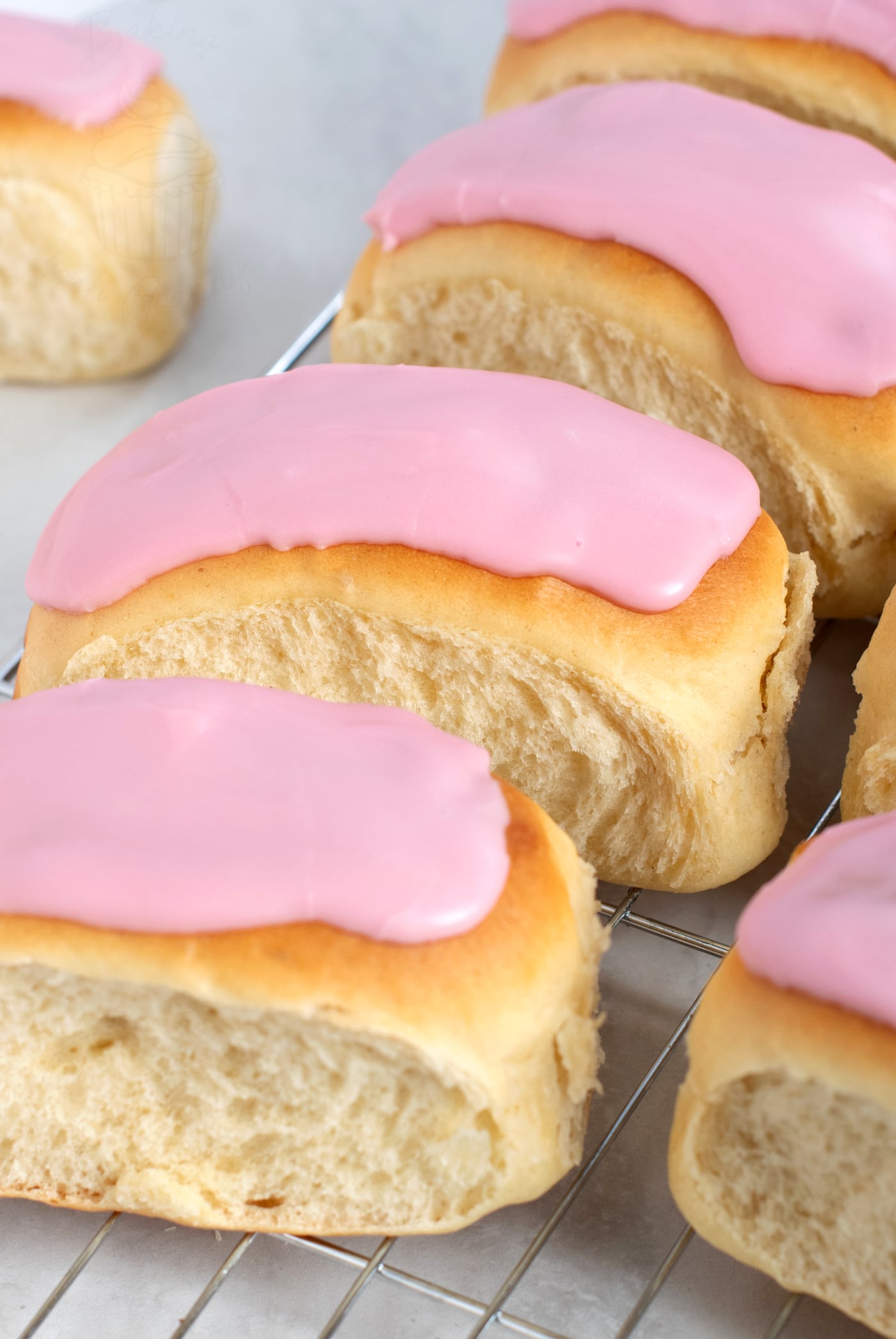 UK recipe for Iced Finger Buns, traditional British cake, found in bakeries across England, Scotland, Wales and Ireland.
