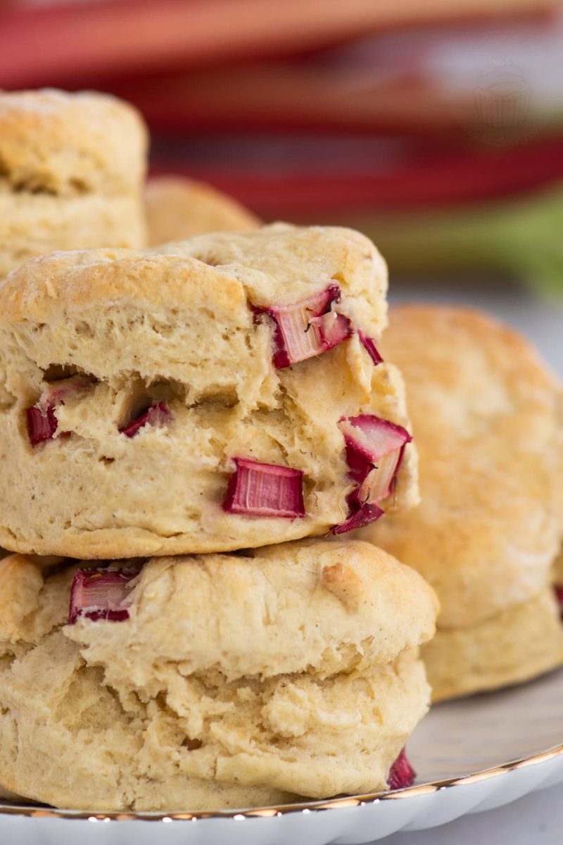 Rhubarb Scones Close-up of Rhubarb Scones in a stacked pile, showing chunks of bright red seasonal rhubarb.